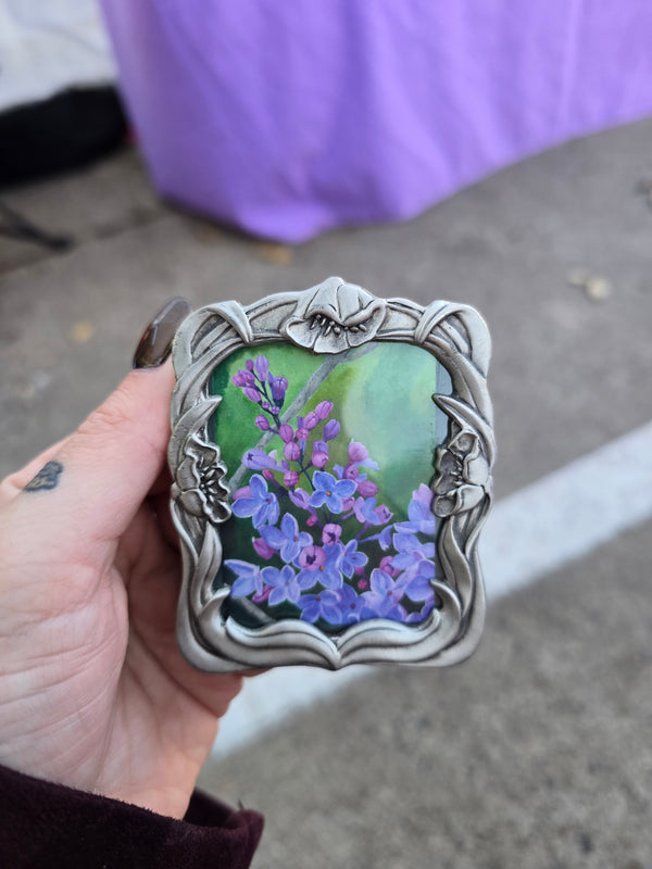 Lilacs in floral frame